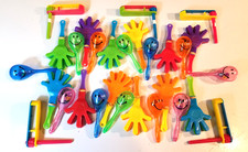 29 TINY NOISE MAKERS: 12 clap hands; 12 rattles; 5 ratchets [DANGER SMALL PARTS]
