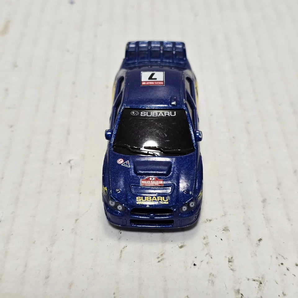 Majorette Subaru Impreza WRC Azul Oscuro n.º 7 - Ruedas Doradas 5YB 1:57 Foto 2 de 4