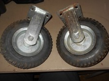 1pr. Cart Wheels. 8"wheel. 10"overall height. Non swivel.