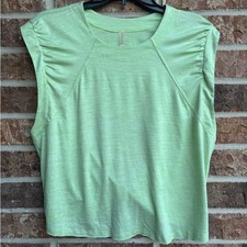Free people movement Light Green Muscle Tee with twist on back Sz M