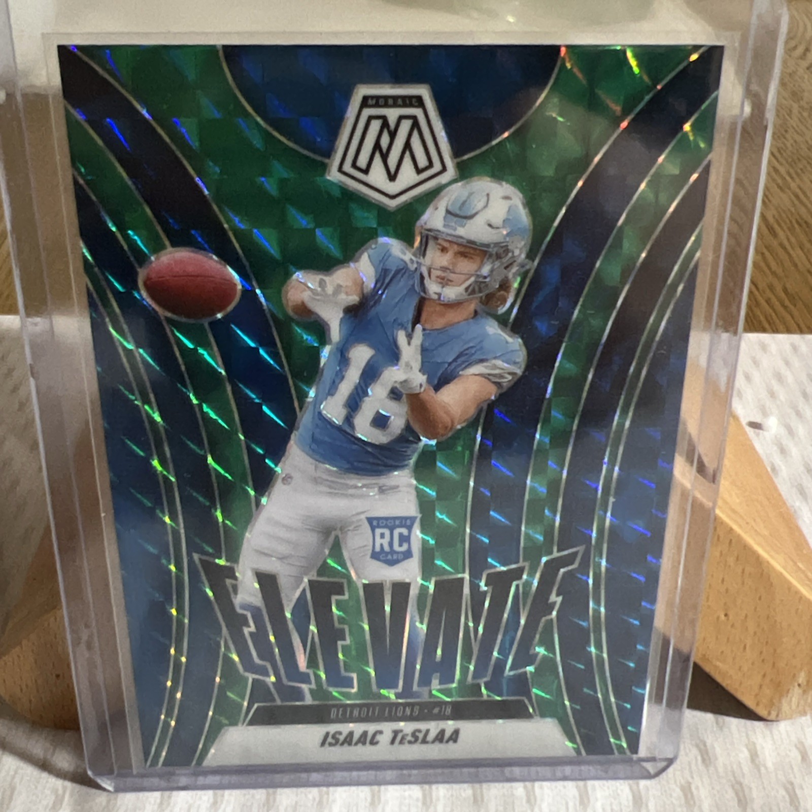 2025 Panini Mosaic - Elevate Isaac Teslaa #8 Green Mosaic Prizm (RC)