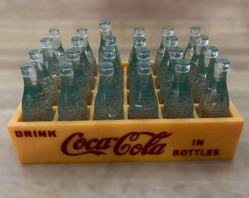 Vintage Mini Plastic Clear Green Coca Cola Bottles in Yellow Crate