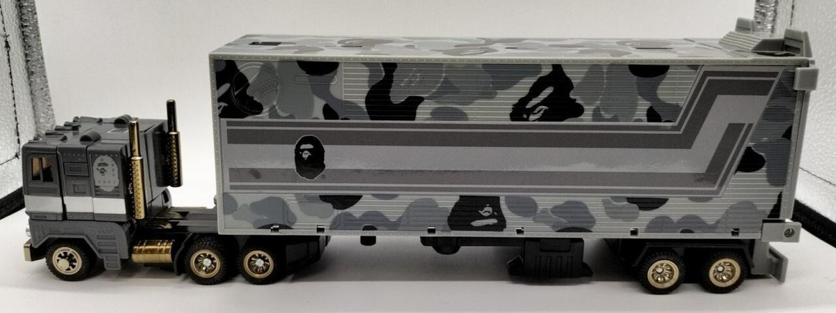 A BATHING APE - TRANSFORMERS OPTIMUS PRIME BAPE®︎ BLACK BATHING APE TRANSFORMERS MP-10K CONVOY BAPE Optimus Prime