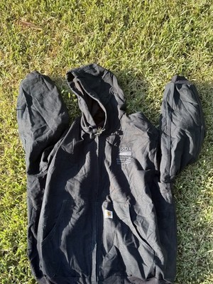 This jacket is a black, hooded, zip-up Carhartt jacket featuring USDA embroidery