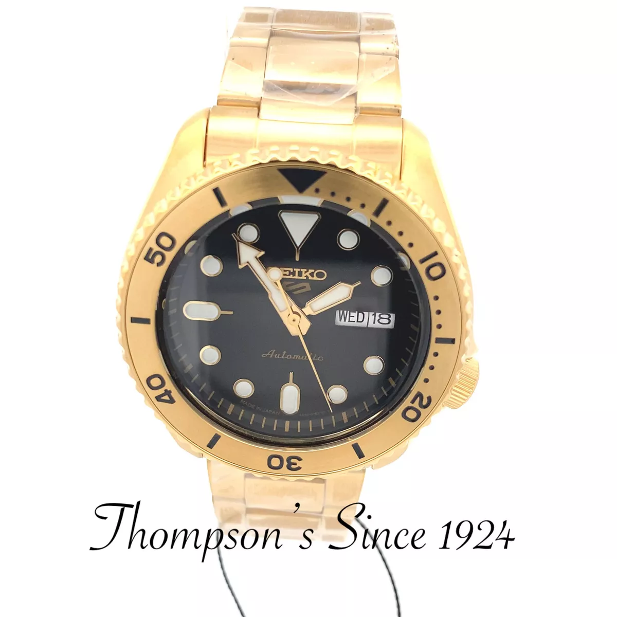Seiko 5 hotsell gold black dial