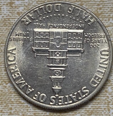 1776-1976 kennedy half dollar no mint mark , upside down reverse