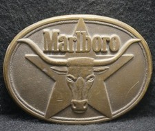 XC19102 VINTAGE 1987 MARLBORO CIGARETTE ADVERTISEMENT SOLID BRASS BELT BUCKLE