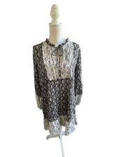 Zara ladies dress size small. Black and white. Peephole tie on the top. Size L