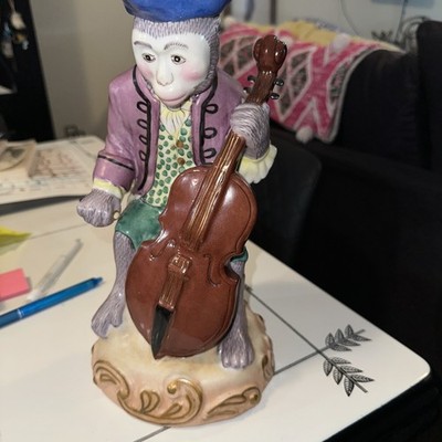 Andrea By Sadek Monkey With A Cello. The Bow Is Broken Off