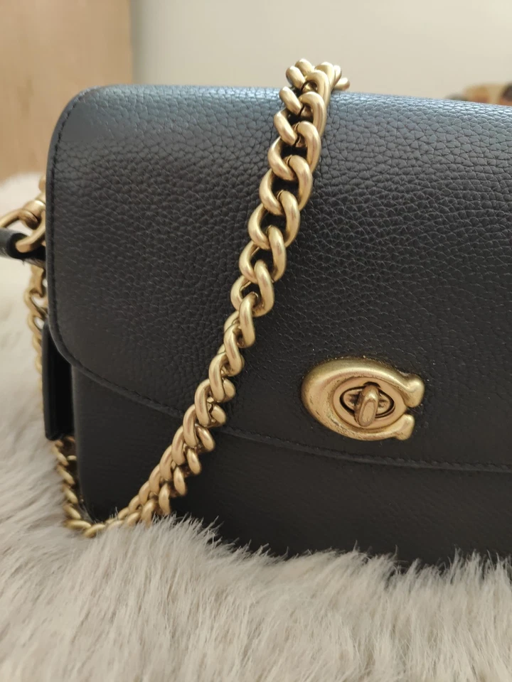 Bandolera COACH Cassie 19 de cuero granulado con cadena asa superior en negro con kit G2U Foto 2 de 4