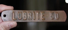 RARE VINTAGE LUBRITE 50 OIL GAS PUMP METAL EMBOSSED ADVERTISING TAG SIGN