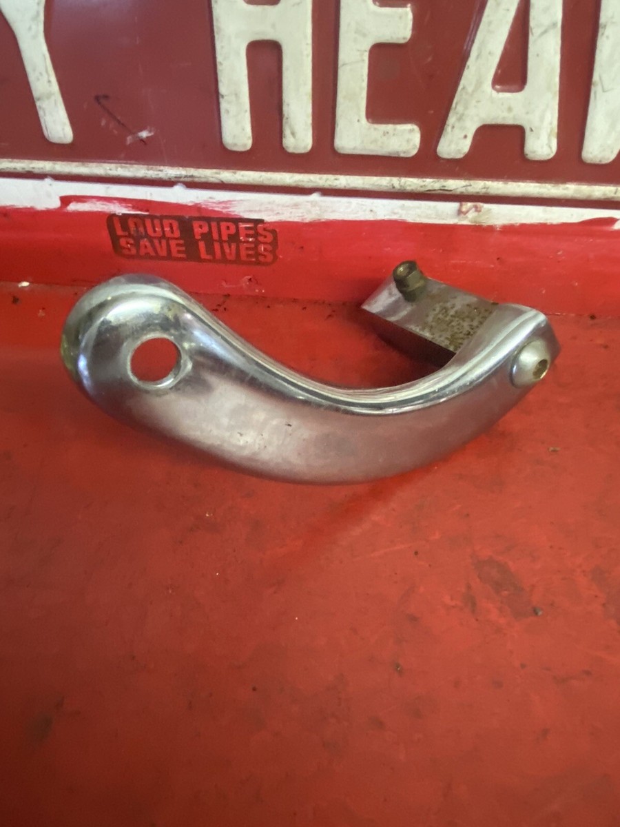 A Harley OEM Panhead Shovelhead chrome passenger buddy foot peg
