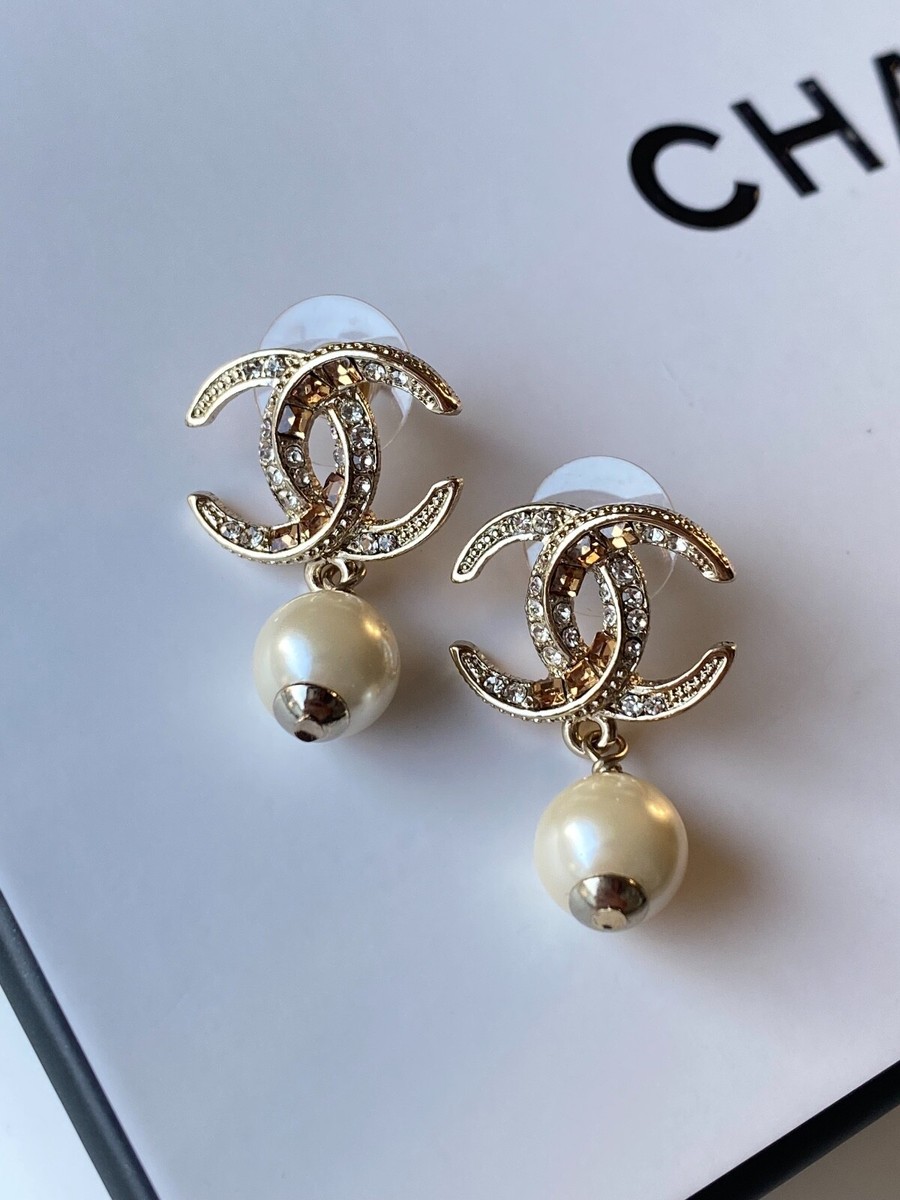 Authentic Chanel Gold Tone CC and Crystal Logo with Pearl Authentic Chanel Gold Tone CC and Crystal Logo with Pearl