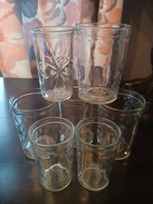Vintage Set Of 4 Medium Sized Glass Jars And 3 Smaller Glass Jars