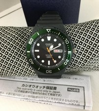 Casio New with Instruction Manual and Box Green Bezel MRW 230H 1E3V 42mm Watch