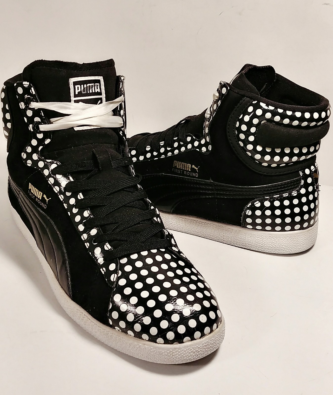 puma black and white high tops
