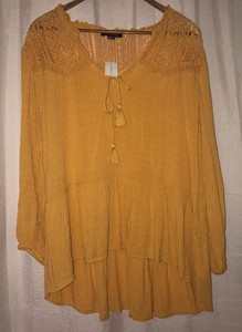 yellow flowy shirt
