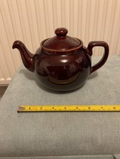 Brown ceramic teapot