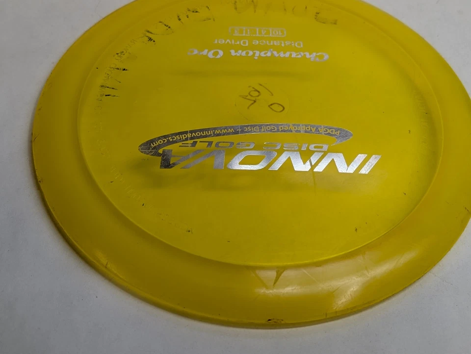 Innova Champion Orc Disc Golf Distance Driver 164g Yellow Old Run Penned - Image 4 of 4