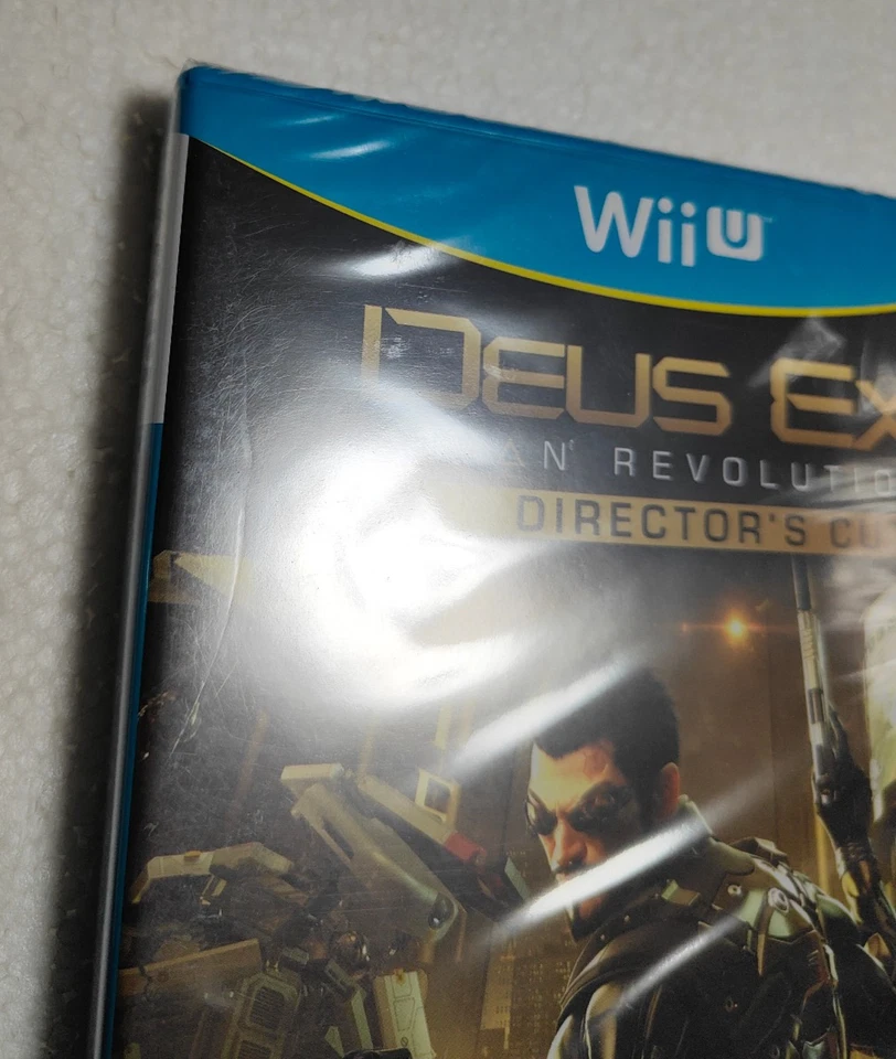 Jeu Deus Ex Human Revolution Director's Cut Wii U Nintendo PAL Fr Neuf Blister - Photo 3/4