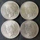 Lot of Four 1925 $1 Peace Silver Dollars