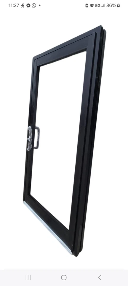 Puerta Storeront. Bronce oscuro. Puerta de entrada comercial de aluminio. Puerta de cristal. Foto 2 de 4