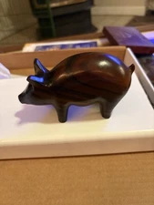 Hand carved Ironwood Heavy Pig. Approx. 5 X 3".  