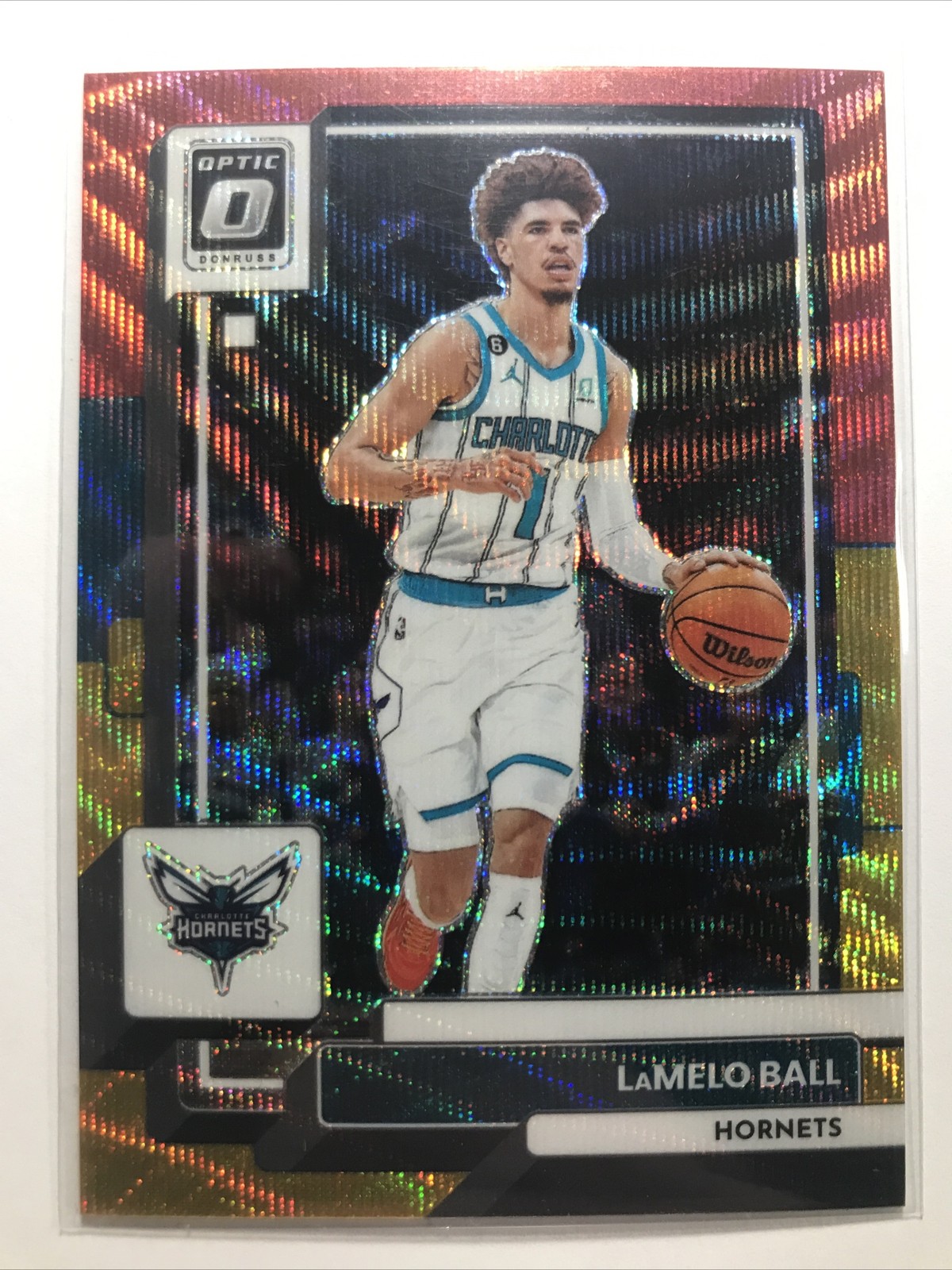 LaMelo Ball 2022-23 Donruss Optic #150 RED GOLD WAVE PRIZM SP HORNETS /99