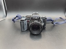 Minolta Maxxum 7000 AF 35mm SLR Camera. PARTS ONLY DONT KNOW ANYTHING ABOUT IT 