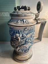 NEW IN BOX AVON LIDDED STEIN, RACECAR.  Box shows slight wear.