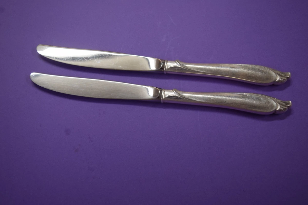 12 Couteaux en argent | Demandez une estimation