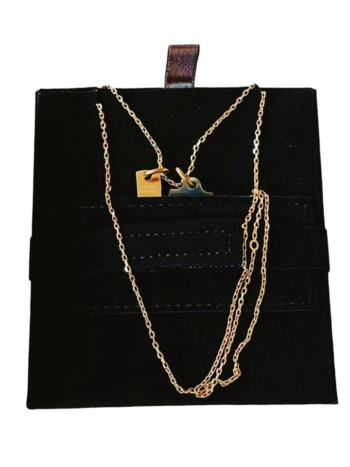 Bolso Kelly Hermès Amulette Maroquinier tono dorado y collar colgante icónico para montar Foto 2 de 4