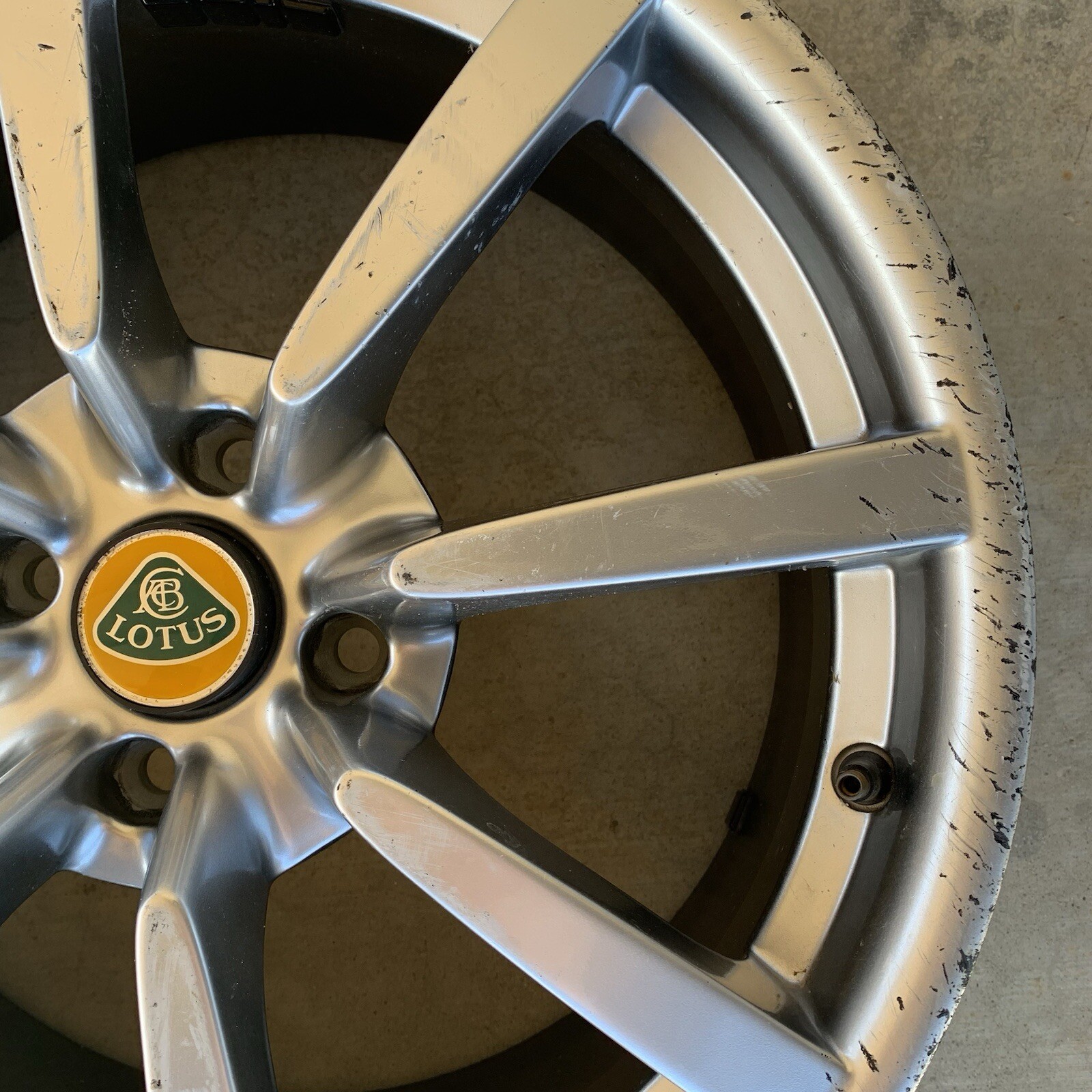 Lotus Wheel Rim Rear 17x7.5 Eight Spoke Silver Curb Rash
