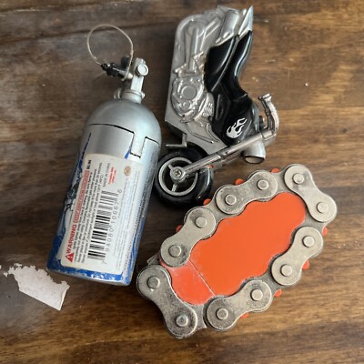 3 Vintage Cigarette Lighters Fast And Furious, ￼ motorcycle, and chain  untested