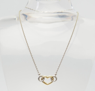 Movado sterling silver 750 18k gold heart link knot elegant