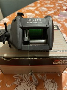 Abu Garcia Ambassadeur 1022 PLUS Matte Black Tactical Fishing Reel Collectible