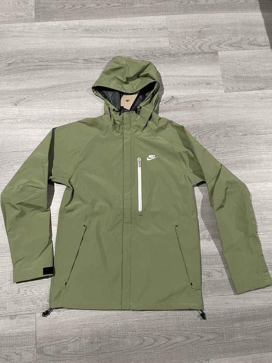 Nike Sportswear Storm-FIT Legacy Hooded Shell Jacket Olives Nike Sportswear Storm-FIT Legacy Hooded Shell Jacket Olives