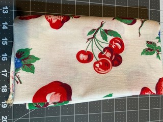 feed sack apples/cherries/strawberries/blueberries w green on white 37x42
