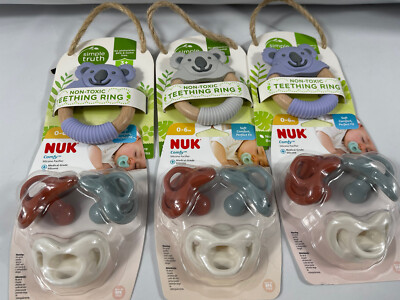 Three Sets Of Teething Rings And Pacifiers