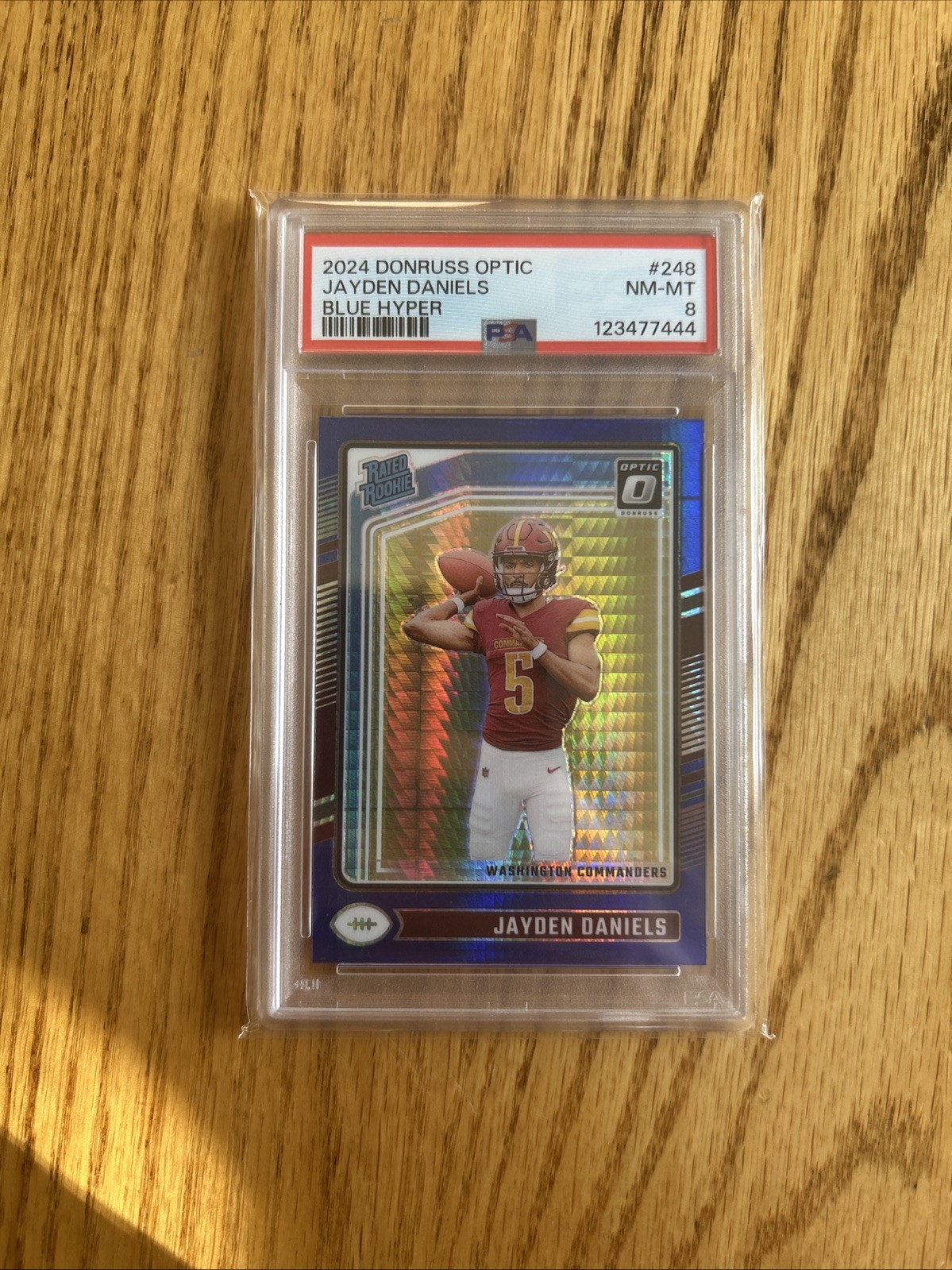 2024 Panini Donruss Optic Jayden Daniels Blue Hyper Rated Rookie #248 PSA 8