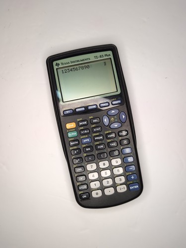 Calculadora gráfica Texas Instruments TI-83 Plus con cubierta probada y funciona muy bien