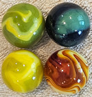 Four 1" Jabo Classic Marbles. Yellow, Orange, Green, and Blue Swirls.  Lot 0153 — photo 2