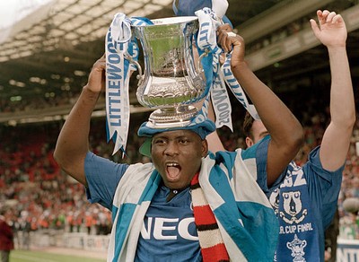 Daniel Amokachi of Everton celebrates with the trophy after their - Old Photo