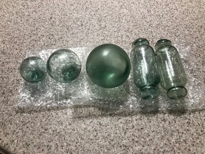 5 glass hand blown floats 1 frosted 2 rolling pin 2 round