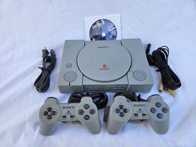 Sony PlayStation 1 Console W/ 2 Controllers And Bundled Game