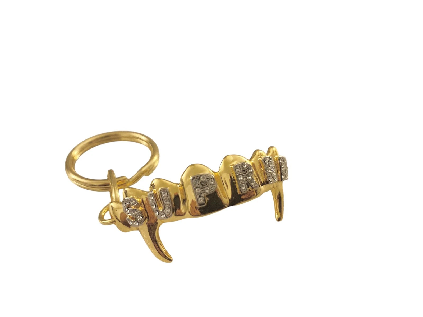 PORTE CLÉS AVANT SUPREME® OR avec autocollants assortis