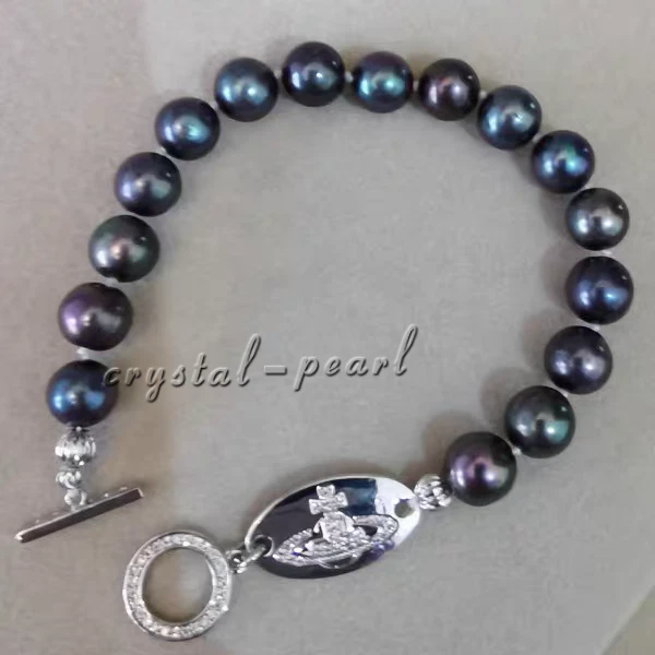 BONITO Impresionante BRAZALETE DE PERLAS 10-11MM AAA Mar del Sur Negro Azul 7.5-8" 925s Foto 2 de 3