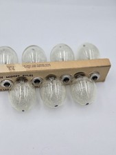 package of 7Vintage Dura- Flash midget bulbs for film camera