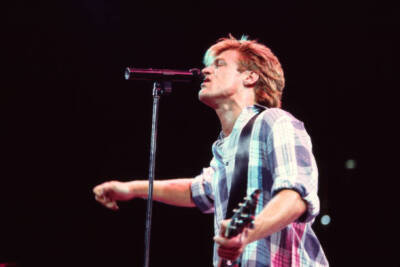Bryan Adams during the 'Reckless' tour, at Byrne Arena 1985 OLD MUSIC PHOTO 13