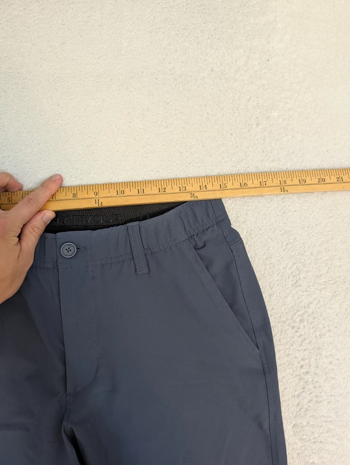 Pantalones de golf Under Armour para hombre 33x30" Match Play sueltos elásticos HeatGear azules Foto 2 de 4